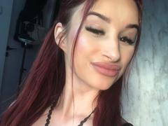 FoxxyAmber - female with red hair and  small tits webcam at xLoveCam