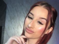 FoxxyAmber - female with red hair and  small tits webcam at xLoveCam