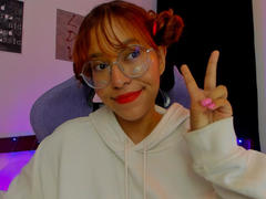 GigimonRamia - female with red hair and  small tits webcam at xLoveCam