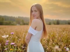 GlamMegi - female with brown hair and  small tits webcam at xLoveCam