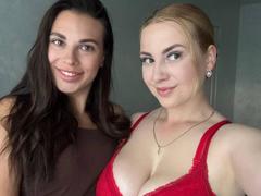 GlossyTwins - female with brown hair and  big tits webcam at xLoveCam
