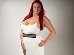 Goddess-Stone - female with red hair and  big tits webcam at xLoveCam