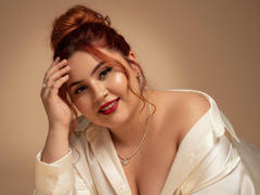 GraceYuly - female with red hair and  big tits webcam at xLoveCam