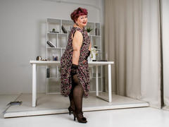 GrannyEva - female with red hair and  big tits webcam at xLoveCam