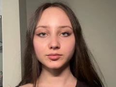 HelgaHumenik - female with brown hair and  small tits webcam at LiveJasmin