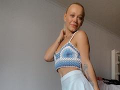 Solmar - blond female with  small tits webcam at xLoveCam