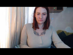 InnocentInna - female with red hair and  big tits webcam at xLoveCam