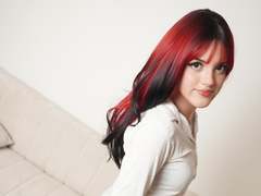 IrisWhitemore - female with red hair webcam at ImLive