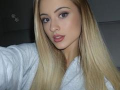 Isidora_Esther - blond female with  big tits webcam at ImLive