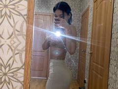 IzettaDingel - female with black hair and  big tits webcam at xLoveCam