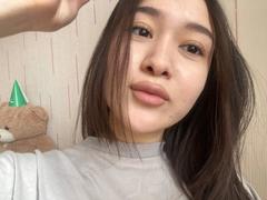 IzettaDingel - female with black hair and  big tits webcam at xLoveCam