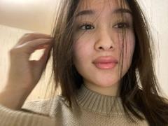 IzettaDingel - female with black hair and  big tits webcam at xLoveCam