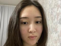 IzettaDingel - female with black hair and  big tits webcam at xLoveCam