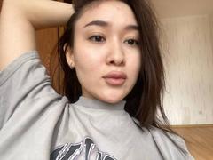 IzettaDingel - female with black hair and  big tits webcam at xLoveCam