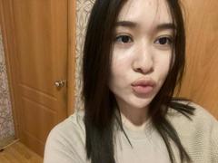 IzettaDingel - female with black hair and  big tits webcam at xLoveCam