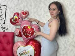 IziPaterson - female with black hair and  small tits webcam at xLoveCam