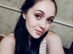IziPaterson - female with black hair and  small tits webcam at xLoveCam