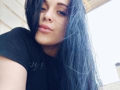 IziPaterson - female with black hair and  small tits webcam at xLoveCam
