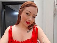 JanneFlower - female with red hair and  big tits webcam at xLoveCam