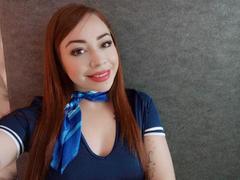 JanneFlower - female with red hair and  big tits webcam at xLoveCam