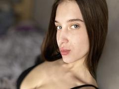 Jassika - female with brown hair and  small tits webcam at xLoveCam
