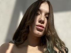 Jassika - female with brown hair and  small tits webcam at xLoveCam