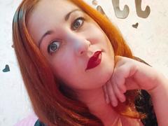 JillSilvies - female with red hair and  big tits webcam at xLoveCam