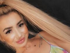 KarmaArms - blond female with  small tits webcam at StripChat