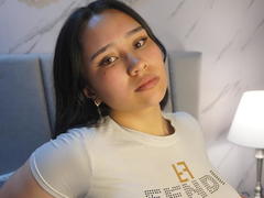 Karollteyes - female with brown hair and  small tits webcam at xLoveCam