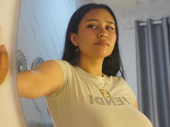 Karollteyes - female with brown hair and  small tits webcam at xLoveCam