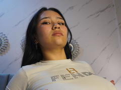 Karollteyes - female with brown hair and  small tits webcam at xLoveCam