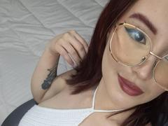 EmilieGordon - female with black hair and  big tits webcam at LiveJasmin