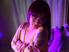 KionI - female with red hair webcam at xLoveCam