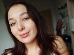 KissMegan - female with brown hair and  small tits webcam at xLoveCam