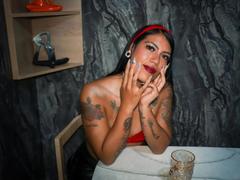 KymCorzo - female with black hair and  big tits webcam at xLoveCam