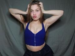 LaraPika - female with red hair and  small tits webcam at xLoveCam