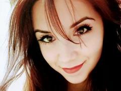 LightDana - female with brown hair and  small tits webcam at xLoveCam