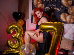 LillyBigAss - female with red hair and  big tits webcam at xLoveCam