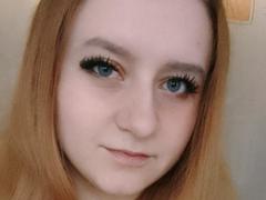 LolaMinnie - female with red hair and  big tits webcam at xLoveCam