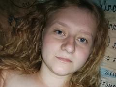 LolaMinnie - female with red hair and  big tits webcam at xLoveCam