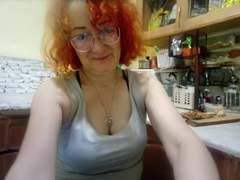 LoversBirdX - female with red hair and  small tits webcam at xLoveCam