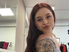 Luucie - female with red hair and  big tits webcam at xLoveCam
