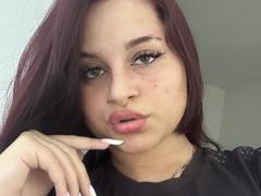 Luucie - female with red hair and  big tits webcam at xLoveCam