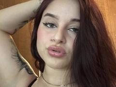 Luucie - female with red hair and  big tits webcam at xLoveCam