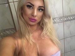 Luxuria - blond female with  big tits webcam at ImLive