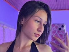 MaddyCarina - female with brown hair and  big tits webcam at xLoveCam
