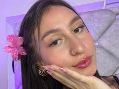 MaddyCarina - female with brown hair and  big tits webcam at xLoveCam