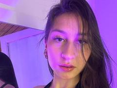 MaddyCarina - female with brown hair and  big tits webcam at xLoveCam