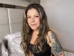 MartinaFiore - female with brown hair and  big tits webcam at xLoveCam