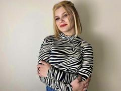 Meddi - female with brown hair and  small tits webcam at xLoveCam